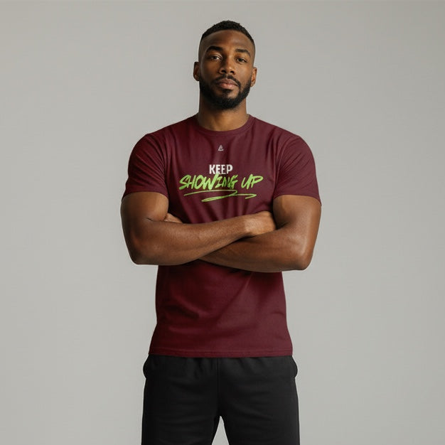 Burgundy unisex performance tee — Keep Showing Up chest print